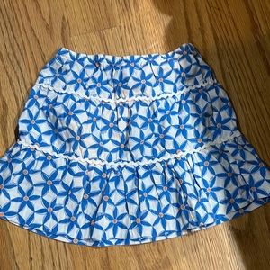 Lilly Pulitzer girl’s skirt (6) in blue, white, and orange.